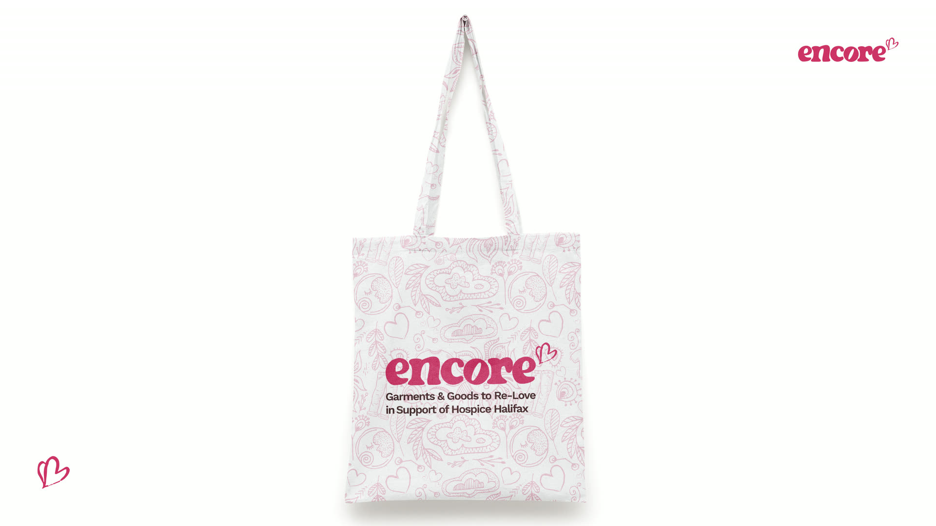 An Encore canvas tote printed with the doodle pattern and the logo lockup