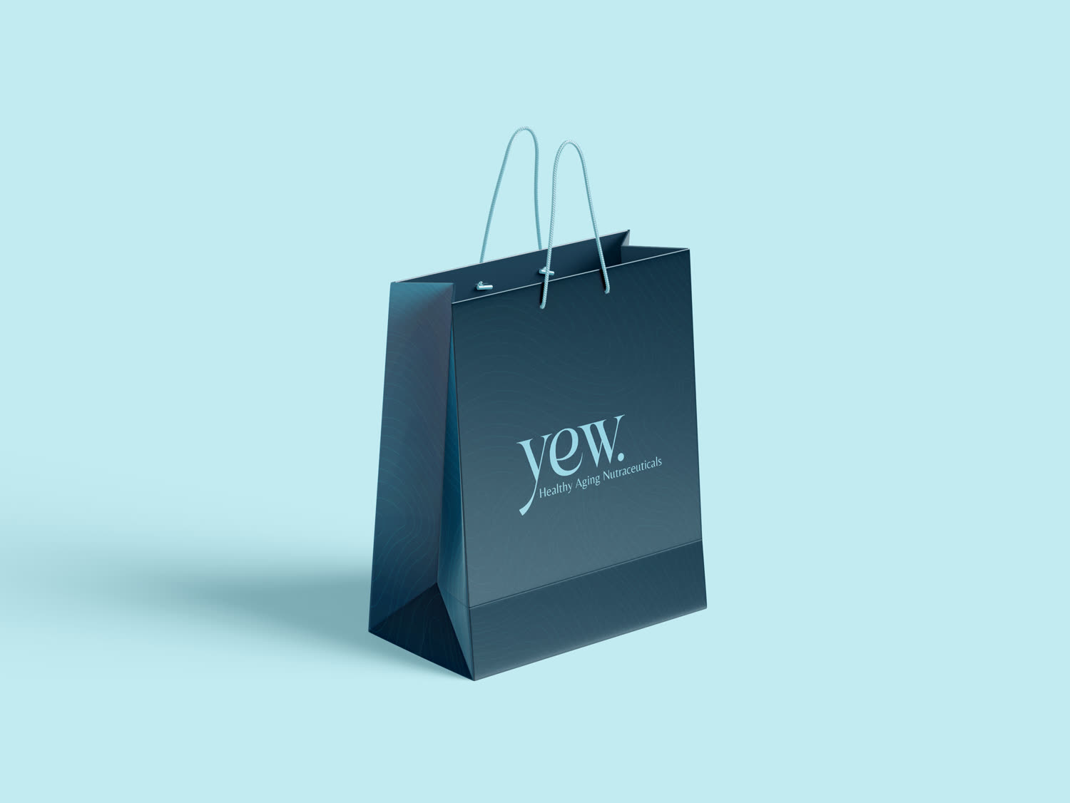 YEW branded gift bag